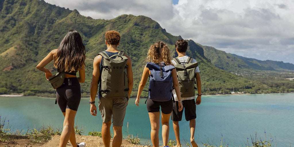 group of people heading to the top of the mountain
